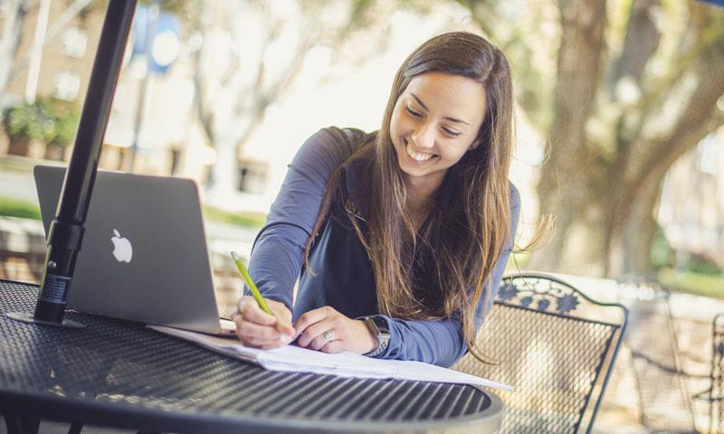 Female student working outside